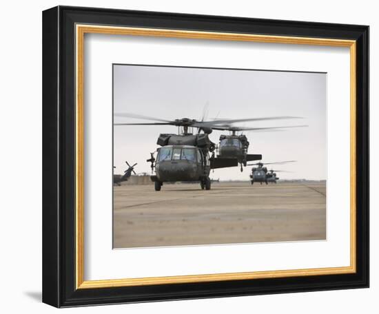 UH-60 Black Hawks Taxis Out for a Mission over Northern Iraq-null-Framed Photographic Print