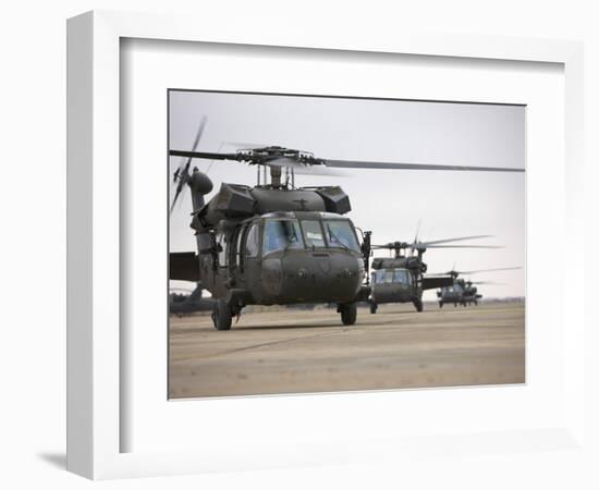 UH-60 Black Hawks Taxis Out for a Mission over Northern Iraq-null-Framed Photographic Print