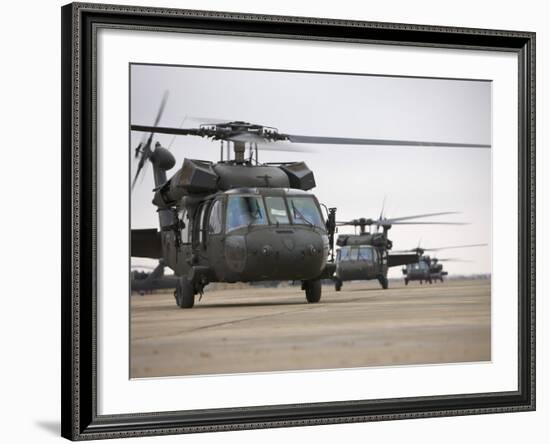 UH-60 Black Hawks Taxis Out for a Mission over Northern Iraq-null-Framed Photographic Print