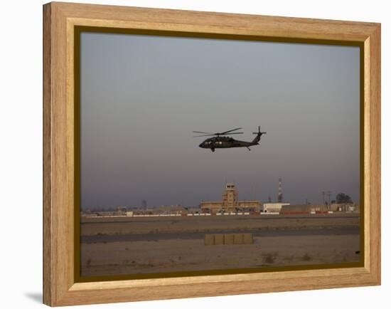 UH-60 Blackhawk Helicopter Flies Past the Tower on Camp Speicher-Stocktrek Images-Framed Premier Image Canvas