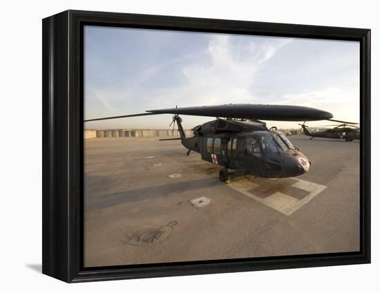 UH-60 Blackhawk Medivac Helicopter Sits on the Flight Deck at Camp Warhorse-Stocktrek Images-Framed Premier Image Canvas