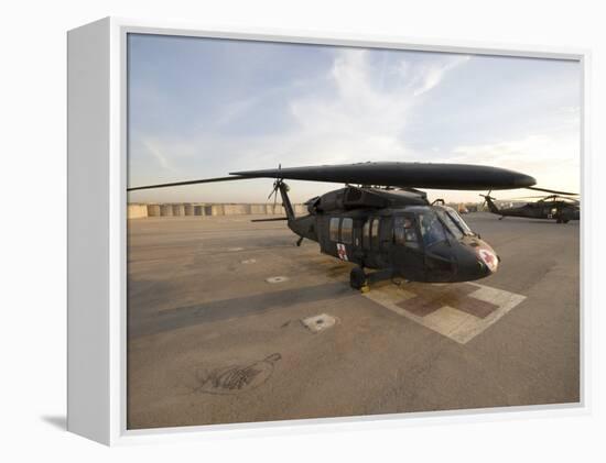 UH-60 Blackhawk Medivac Helicopter Sits on the Flight Deck at Camp Warhorse-Stocktrek Images-Framed Premier Image Canvas