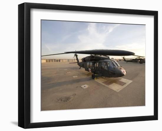UH-60 Blackhawk Medivac Helicopter Sits on the Flight Deck at Camp Warhorse-Stocktrek Images-Framed Photographic Print