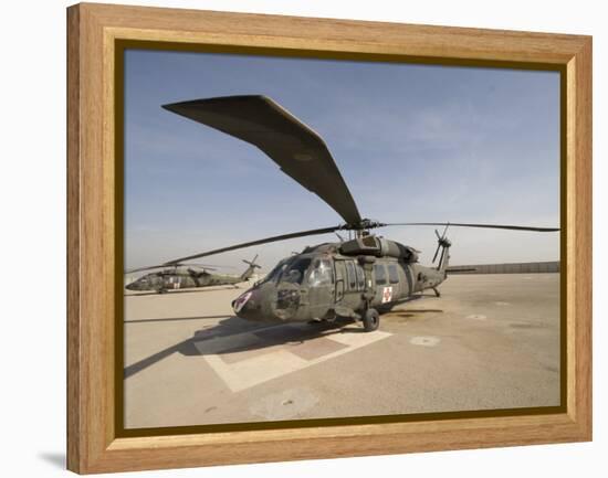 UH-60 Blackhawk Medivac Helicopter Sits on the Flight Deck at Camp Warhorse-Stocktrek Images-Framed Premier Image Canvas