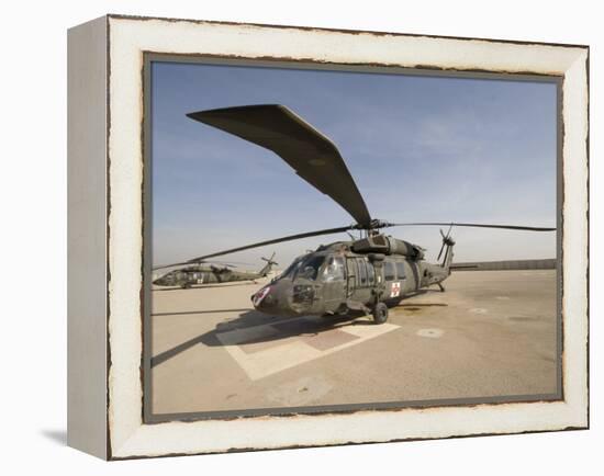 UH-60 Blackhawk Medivac Helicopter Sits on the Flight Deck at Camp Warhorse-Stocktrek Images-Framed Premier Image Canvas