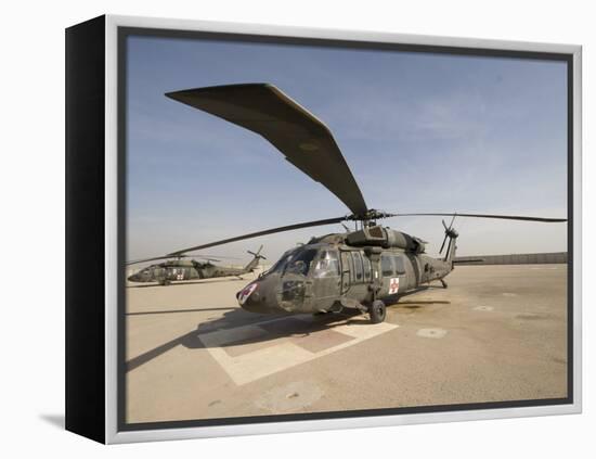 UH-60 Blackhawk Medivac Helicopter Sits on the Flight Deck at Camp Warhorse-Stocktrek Images-Framed Premier Image Canvas