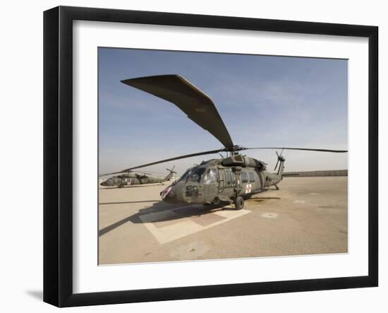 UH-60 Blackhawk Medivac Helicopter Sits on the Flight Deck at Camp Warhorse-Stocktrek Images-Framed Photographic Print