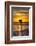 Uk, Cornwall, Polzeath. a Woman Comes in from an Evening Surf Against a Stunning Sunset.-Niels Van Gijn-Framed Photographic Print