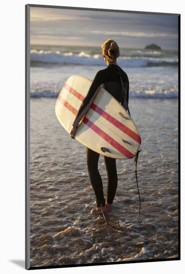 Uk, Cornwall, Polzeath. a Woman Looks Out to See, Preparing for an Evening Surf. Mr-Niels Van Gijn-Mounted Photographic Print