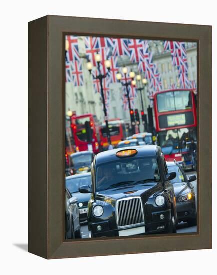 UK, England, London, Regent Street, Taxis and Union Jack Flags-Alan Copson-Framed Premier Image Canvas