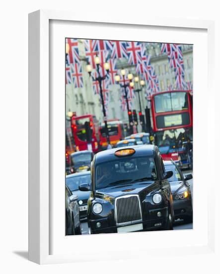 UK, England, London, Regent Street, Taxis and Union Jack Flags-Alan Copson-Framed Photographic Print