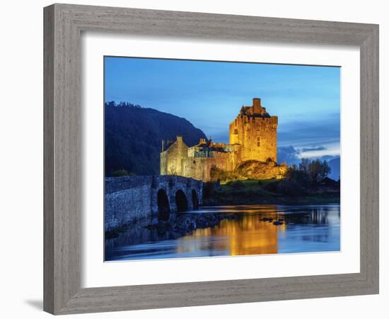 UK, Scotland, Highlands, Dornie, Twilight view of the Eilean Donan Castle.-Karol Kozlowski-Framed Photographic Print