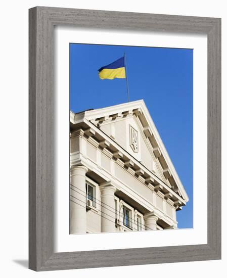Ukrainian Flag Atop Classical Architecture, Kiev, Ukraine, Europe-Christian Kober-Framed Photographic Print