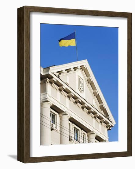 Ukrainian Flag Atop Classical Architecture, Kiev, Ukraine, Europe-Christian Kober-Framed Photographic Print