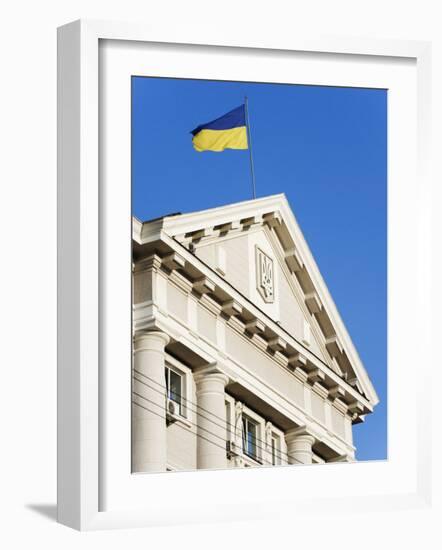 Ukrainian Flag Atop Classical Architecture, Kiev, Ukraine, Europe-Christian Kober-Framed Photographic Print