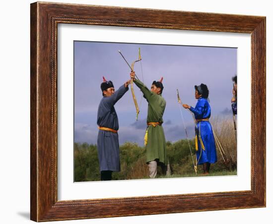 Ulan Bator, Family Competing in an Archery Competition at the National Day Celebrations, Mongolia-Paul Harris-Framed Photographic Print