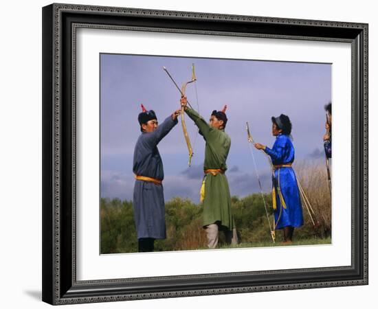 Ulan Bator, Family Competing in an Archery Competition at the National Day Celebrations, Mongolia-Paul Harris-Framed Photographic Print