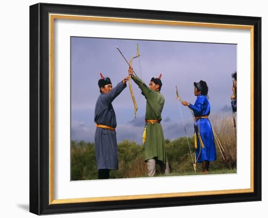 Ulan Bator, Family Competing in an Archery Competition at the National Day Celebrations, Mongolia-Paul Harris-Framed Photographic Print