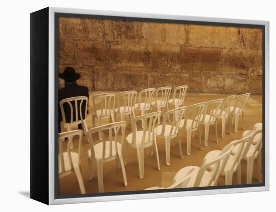 Ultra-Orthodox Jewish Man Sits During a Procession Bringing a Torah Scroll from the Western Wall-null-Framed Premier Image Canvas