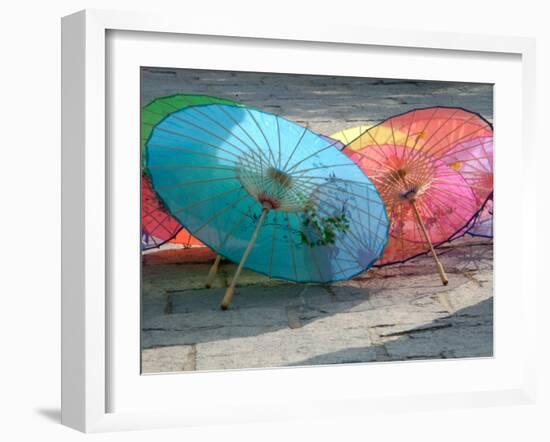 Umbrellas For Sale, China-Bruce Behnke-Framed Photographic Print