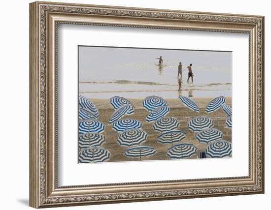 Umbrellas on the Beach, Family in the Sea, Jesolo, Venetian Lagoon, Veneto, Italy-James Emmerson-Framed Photographic Print