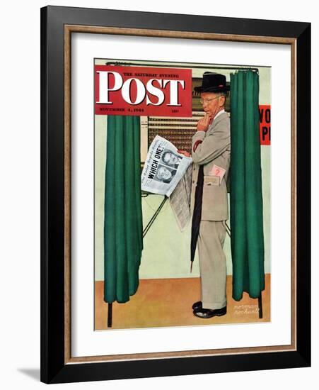 "Undecided" Saturday Evening Post Cover, November 4, 1944.  Man in voting booth w/newspaper.-Norman Rockwell-Framed Giclee Print