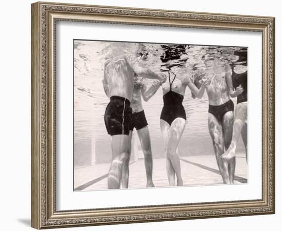 Underwater Shot of Actress Daphne Dayle in Topless, One Piece Swim Suit by Designer Ruben Torres-Paul Schutzer-Framed Photographic Print