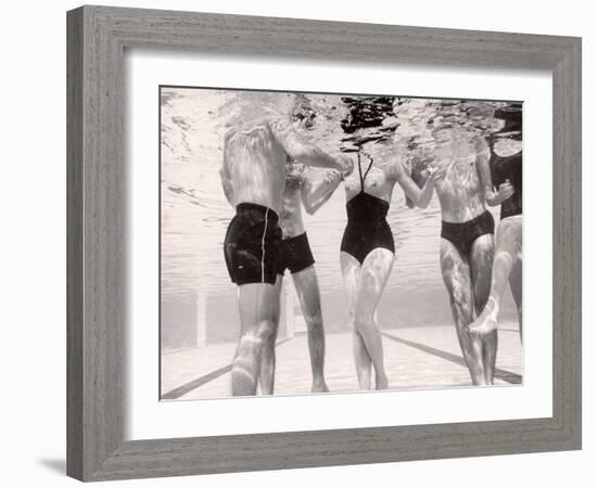 Underwater Shot of Actress Daphne Dayle in Topless, One Piece Swim Suit by Designer Ruben Torres-Paul Schutzer-Framed Photographic Print