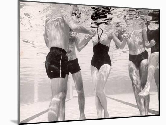 Underwater Shot of Actress Daphne Dayle in Topless, One Piece Swim Suit by Designer Ruben Torres-Paul Schutzer-Mounted Photographic Print