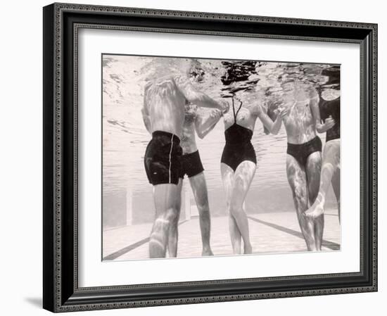 Underwater Shot of Actress Daphne Dayle in Topless, One Piece Swim Suit by Designer Ruben Torres-Paul Schutzer-Framed Photographic Print