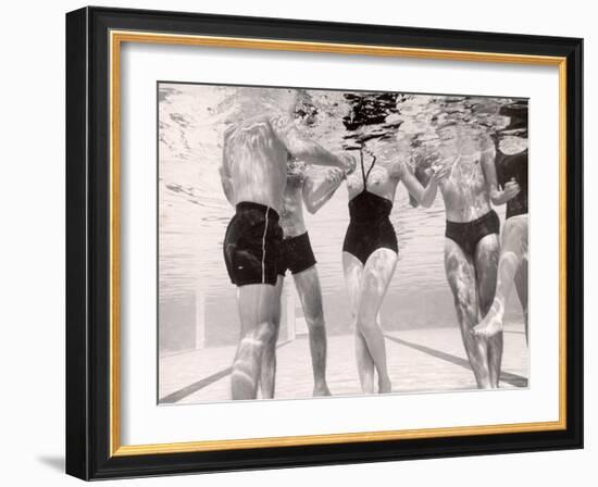 Underwater Shot of Actress Daphne Dayle in Topless, One Piece Swim Suit by Designer Ruben Torres-Paul Schutzer-Framed Photographic Print