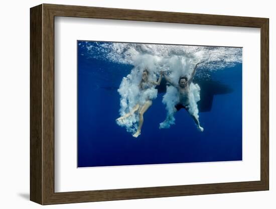 Underwater View of the Young Couple Having Fun and Jumping into the Clear Sea from a Boat-Dudarev Mikhail-Framed Photographic Print