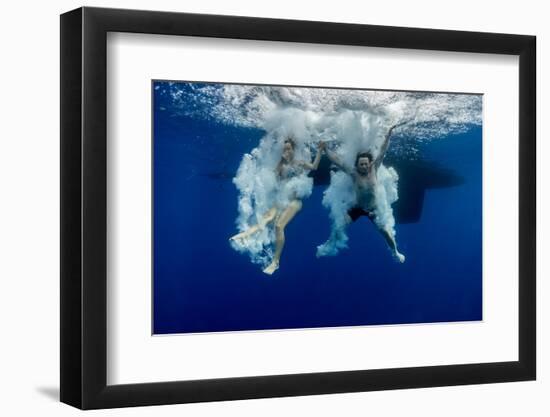 Underwater View of the Young Couple Having Fun and Jumping into the Clear Sea from a Boat-Dudarev Mikhail-Framed Photographic Print