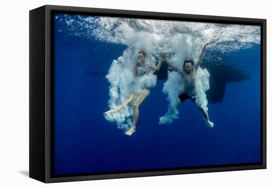 Underwater View of the Young Couple Having Fun and Jumping into the Clear Sea from a Boat-Dudarev Mikhail-Framed Premier Image Canvas