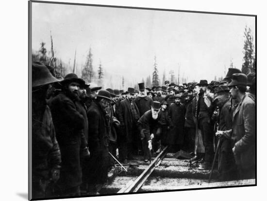 Unident. Man Driving in Last Spike of Canadian Pacific Railroad-null-Mounted Photographic Print