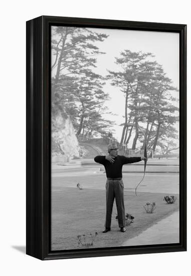 Unidentified Honda Worker in Tokyo Shooting Arrow, 1967-Takeyoshi Tanuma-Framed Premier Image Canvas