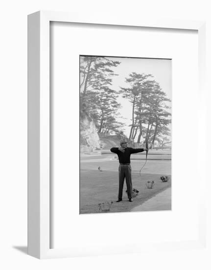Unidentified Honda Worker in Tokyo Shooting Arrow, 1967-Takeyoshi Tanuma-Framed Photographic Print
