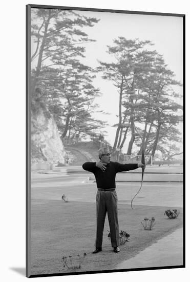 Unidentified Honda Worker in Tokyo Shooting Arrow, 1967-Takeyoshi Tanuma-Mounted Photographic Print