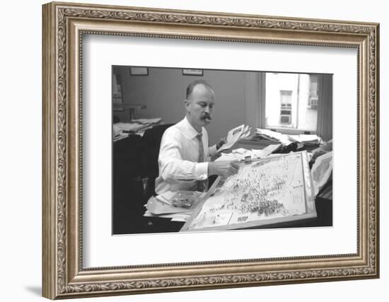 Unidentified Man Pinning a Us Map with Political Religious Bias Statistics, 1960-Walter Sanders-Framed Photographic Print