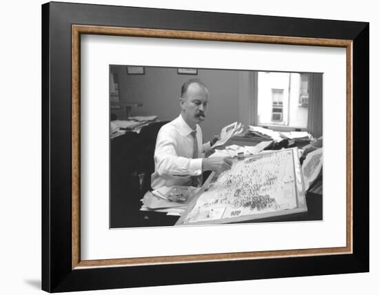 Unidentified Man Pinning a Us Map with Political Religious Bias Statistics, 1960-Walter Sanders-Framed Photographic Print