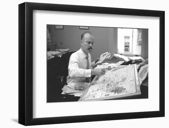 Unidentified Man Pinning a Us Map with Political Religious Bias Statistics, 1960-Walter Sanders-Framed Photographic Print