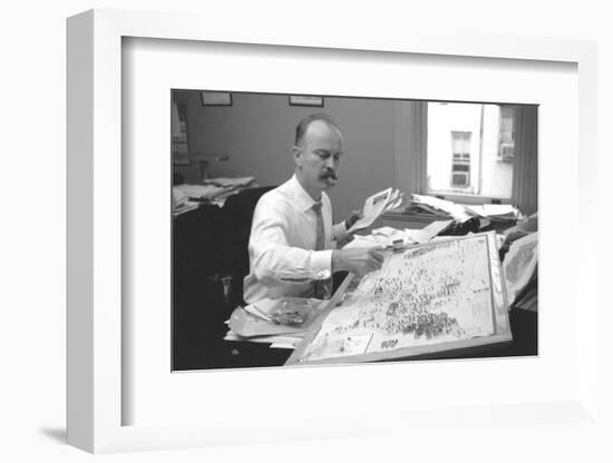 Unidentified Man Pinning a Us Map with Political Religious Bias Statistics, 1960-Walter Sanders-Framed Photographic Print