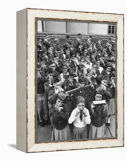 Uniformed Children Who Are Members of Levittown Harmonica Band Playing Harmonicas-Peter Stackpole-Framed Premier Image Canvas