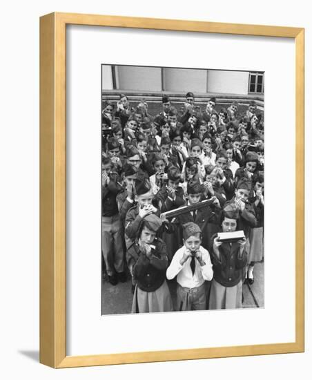 Uniformed Children Who Are Members of Levittown Harmonica Band Playing Harmonicas-Peter Stackpole-Framed Photographic Print