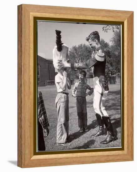 Uniformed Drum Major for the University of Michigan Marching Band on a March Across the Campus Lawn-Alfred Eisenstaedt-Framed Premier Image Canvas