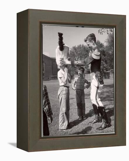 Uniformed Drum Major for the University of Michigan Marching Band on a March Across the Campus Lawn-Alfred Eisenstaedt-Framed Premier Image Canvas