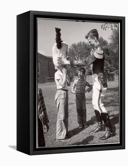 Uniformed Drum Major for the University of Michigan Marching Band on a March Across the Campus Lawn-Alfred Eisenstaedt-Framed Premier Image Canvas