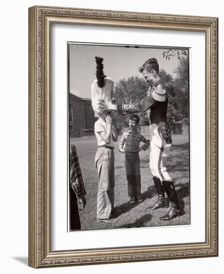 Uniformed Drum Major for the University of Michigan Marching Band on a March Across the Campus Lawn-Alfred Eisenstaedt-Framed Photographic Print