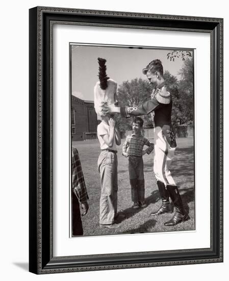 Uniformed Drum Major for the University of Michigan Marching Band on a March Across the Campus Lawn-Alfred Eisenstaedt-Framed Photographic Print