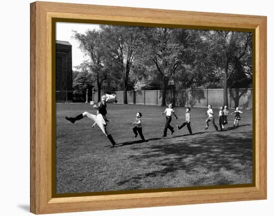 Uniformed Drum Major For University of Michigan Marching Band Practicing His High Kicking Prance-Alfred Eisenstaedt-Framed Premier Image Canvas